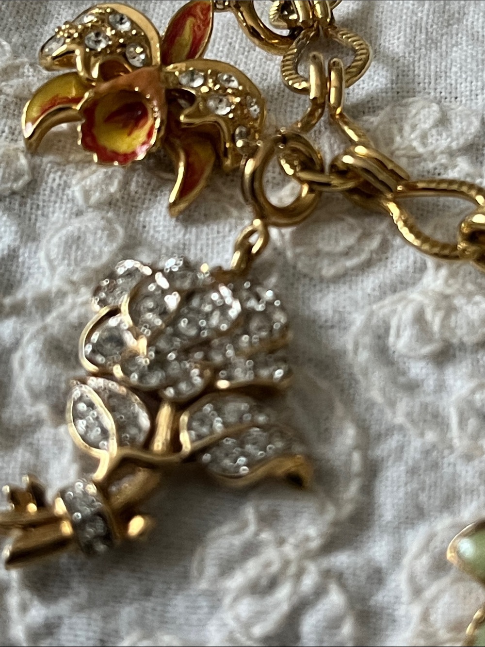 Nolan Miller charm bracelet with orchid charms - Picture 5 of 12